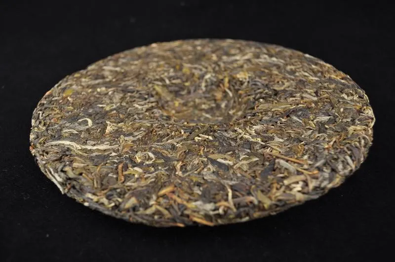 2012 Yunnan Sourcing "Zhu Peng Zhai" Wild Arbor Raw Pu-erh Tea Cake